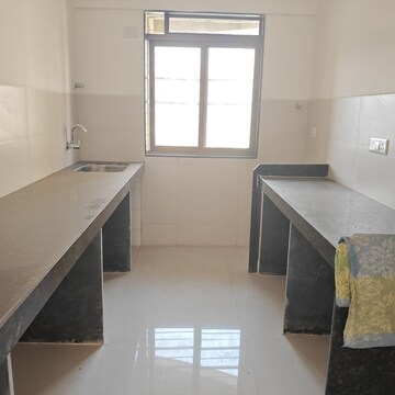 Kitchen in 2 BHK Apartment at Acme Ozone Phase II, Manpada – for Rent