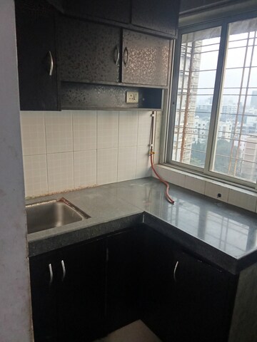 Kitchen in 1 BHK Apartment at Om Kalyani CHS, Dahisar West – for Rent
