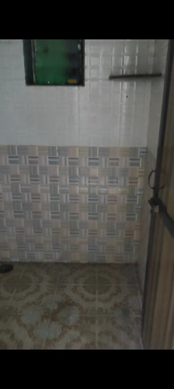 Bathroom in 1 BHK Apartment at Ganga CHS Kurla West, Kurla West – for Rent