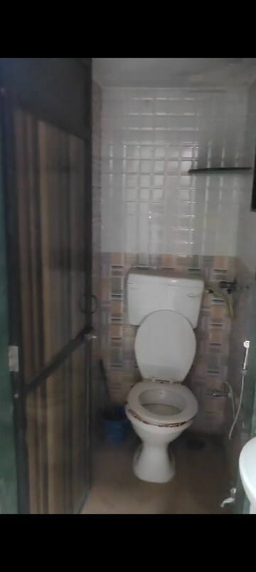 Bathroom in 1 BHK Apartment at Ganga CHS Kurla West, Kurla West – for Rent