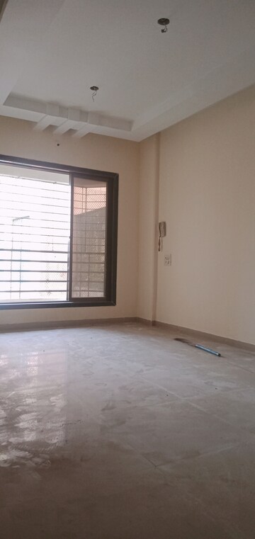 Living Room in 2 BHK Apartment at Jainam Shubham Heights, Mira Road East – for Rent