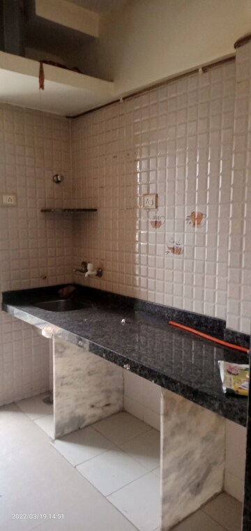 Kitchen in 2 BHK Apartment at Teerth Plaza, Mira Road – for Rent