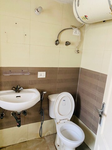 Bathroom in 3 BHK Apartment at Gardenia Golf City, Sector 75 – for Rent