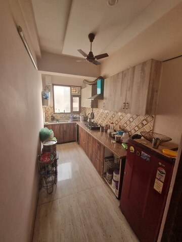 Kitchen in 3 BHK Apartment at Ansal API Victoria Floors, Dhakoli Village – for Rent