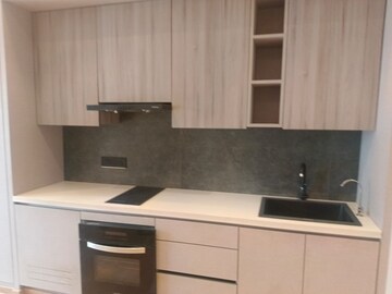 Kitchen in Studio Apartment at Galaxy Blue Sapphire Plaza, Sector 4, Greater Noida – for Rent