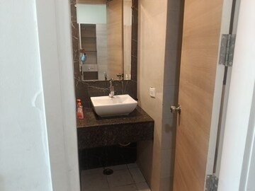 Bathroom in Studio Apartment at Gaur City Mall, Sector 4, Greater Noida – for Rent