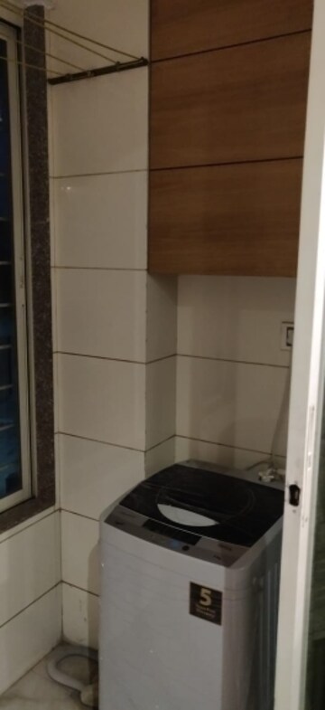 Bathroom in 1 BHK Apartment at New Mhada Tower, Malad West – for Rent