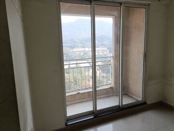 Living Room in 1 BHK Apartment at JP North Elara, Mira Road – for Rent