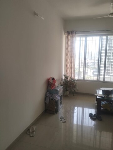 Living Room in 1 BHK Apartment at Ganesh Galaxy Residency, Ravet – for Rent