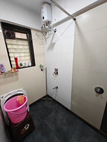 Bathroom in 2 BHK Apartment at Palash Towers, Andheri West – for Rent