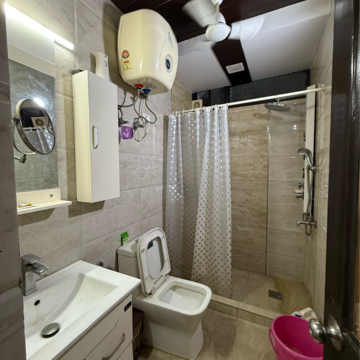 Bathroom in 2 BHK Builder Floor at Kalkaji – for Rent