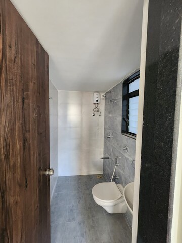 Bathroom in 2 BHK Apartment at Shreedham Splendour, Andheri West – for Rent