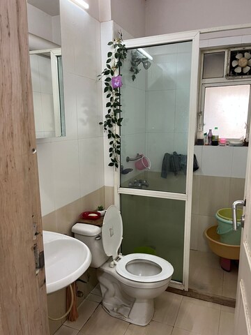 Bathroom in 3 BHK Apartment at Hiranandani Skylark Enclave, Ghodbunder Road – for Rent