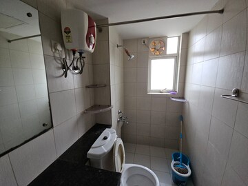 Bathroom in 4 BHK Apartment at Great Value Sharanam, Sector 107 – for Rent