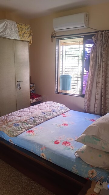 Bedroom in 2 BHK Apartment at Samartha Ashish CHS, Andheri West – for Rent