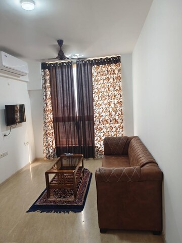 Living Room in 2 BHK Apartment at Hiranandani Delanna, Ghodbunder Road – for Rent