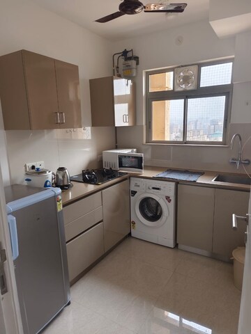 Kitchen in 2 BHK Apartment at Hiranandani Delanna, Ghodbunder Road – for Rent