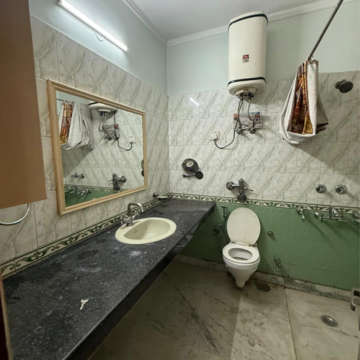 Bathroom in 3 BHK Builder Floor at Kailash Colony – for Rent