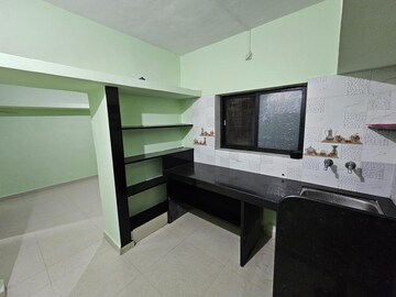 Kitchen in 1.5 BHK Independent House at Wadgaon Sheri – for Rent