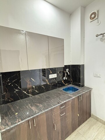 Kitchen in 1 RK Builder Floor at Ansal Sushant Lok I, Sector 43 – for Rent