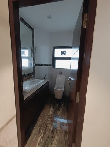 Kitchen in 4 BHK Apartment at Basant Garden – for Rent