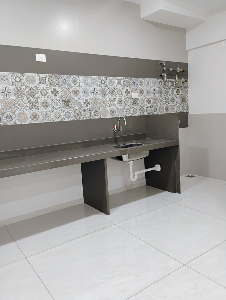 Kitchen, magarpatta-nova-residency 3.5 Bedroom 1427 Sq.Ft. Apartment In Mugawade Pune 8100512