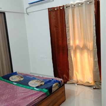 Bedroom in 2 BHK Apartment at Ashar Axis, Subhash Nagar – for Rent