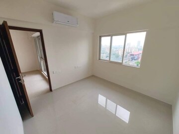 Room in 2 BHK Apartment at Omkar Signet, Malad East – for Rent