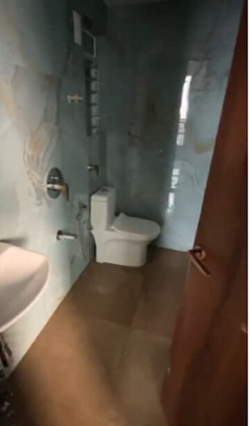 Bathroom in 1 BHK Apartment at Pramanik Walchand Paradise, Mira Road – for Rent