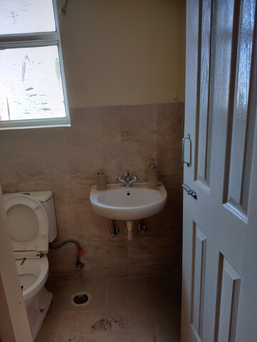 Bathroom in 2 BHK Apartment at Wave Dream Homes, Wave City – for Rent