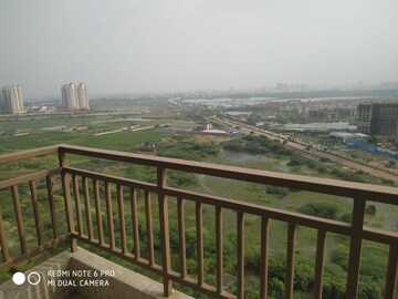 Balcony in 4 BHK Apartment at Adani Oyster Greens, Sector 102 – for Rent