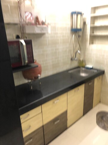 Kitchen in 1.5 BHK Apartment at Surya Enclave Co op hsg Society, Manpada – for Rent