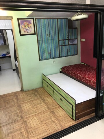 Bedroom in 1.5 BHK Apartment at Surya Enclave Co op hsg Society, Manpada – for Rent