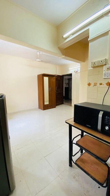 Kitchen in Studio Apartment at Juhu Scheme, Juhu – for Rent