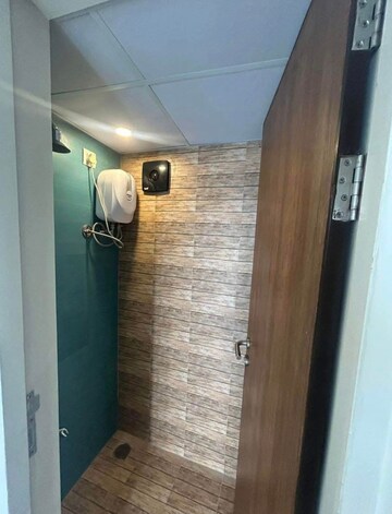 Bathroom in 1 BHK Apartment at Lodha Crown Quality Homes, Majiwada – for Rent