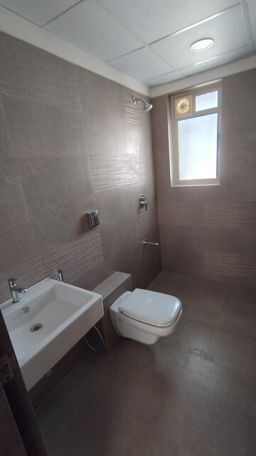 Bathroom in 3 BHK Apartment at Mantra Monarch, Balewadi – for Rent