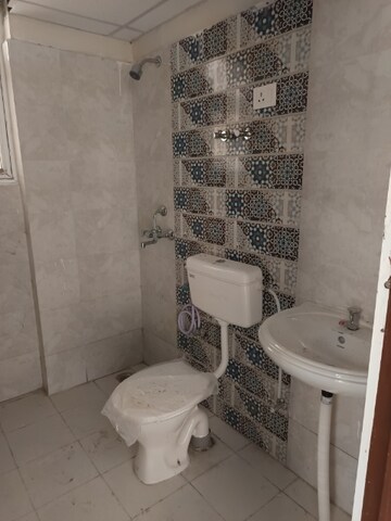Bathroom in 2 BHK Apartment at Signature Global Proxima, Sector 89 – for Rent