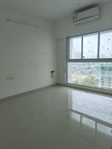 Room in 2 BHK Apartment at Rustomjee Erika, Bandra East – for Rent