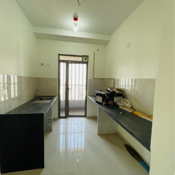 Kitchen in 2 BHK Apartment at Kalpataru Paramount A, Majiwada – for Rent