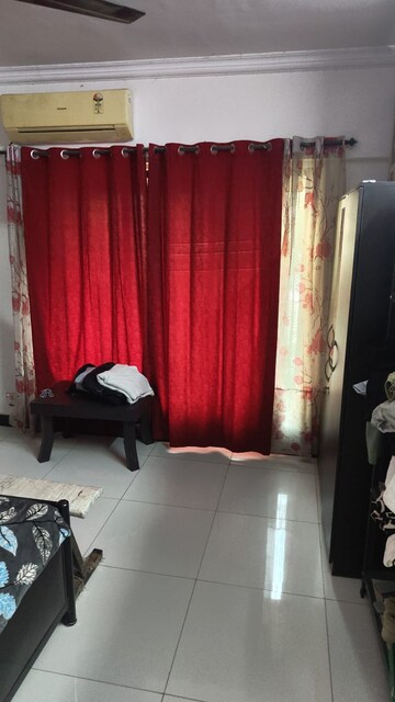 Living Room in 1 BHK Apartment at Royal Palms, Goregaon East – for Rent