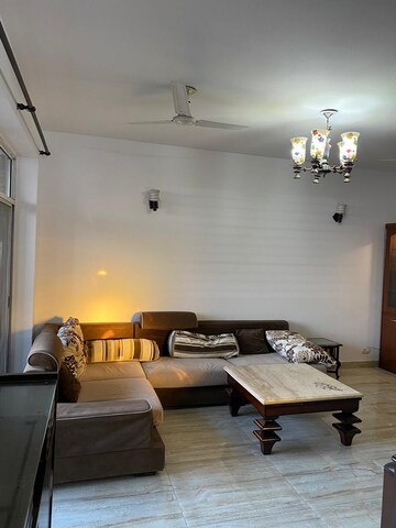 Living Room in 2 BHK Apartment at Paramount Orchid, Sain Vihar – for Rent