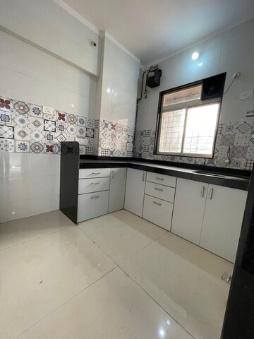 Kitchen in 1 BHK Apartment at Hirani Skyview Castle, Kurla – for Rent