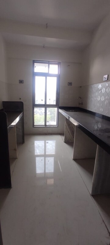 Kitchen in 2 BHK Apartment at Shiv Shakti Tower 28, Malad East – for Rent