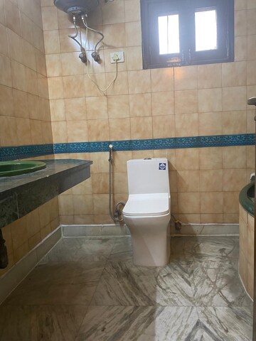 Bathroom in 4 BHK Builder Floor at Saket – for Rent