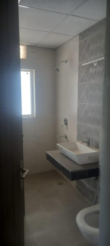 Bathroom in 3 BHK Apartment at Sunworld Vanalika, Sector 107 – for Sale