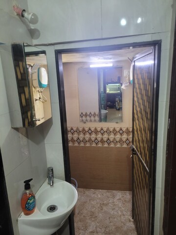 Bathroom in 2 BHK Apartment at Deep Jaydeep CHS, Kopar Khairane – for Sale