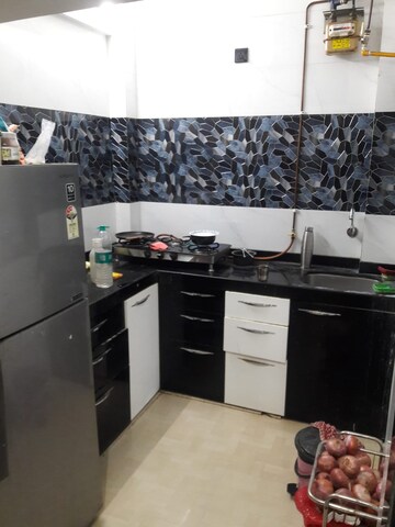 Kitchen in 2 BHK Apartment at Deep Jaydeep CHS, Kopar Khairane – for Sale