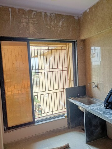 Kitchen in 1 BHK Apartment at Triveni Dynamic Ultima Bliss, Kalyan West – for Sale