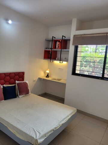 Living Room in 2 BHK Apartment at Magarpatta Riverview City Hornbill Heights, Loni Kalbhor – for Sale