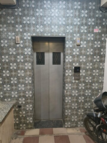 Building Lobby in 3 BHK Apartment at Raj Nagar Extension – for Rent